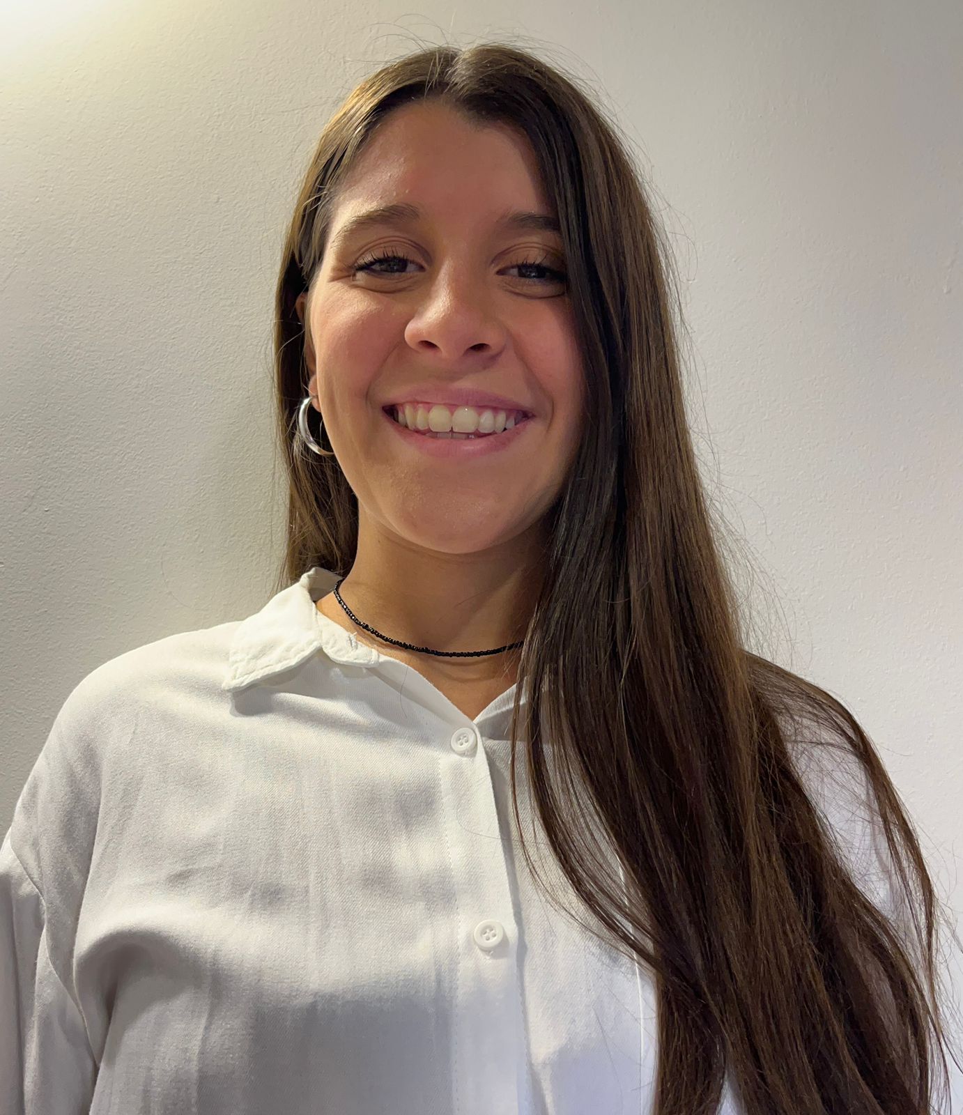 A professional portrait of Maria Emilia Bianchi.